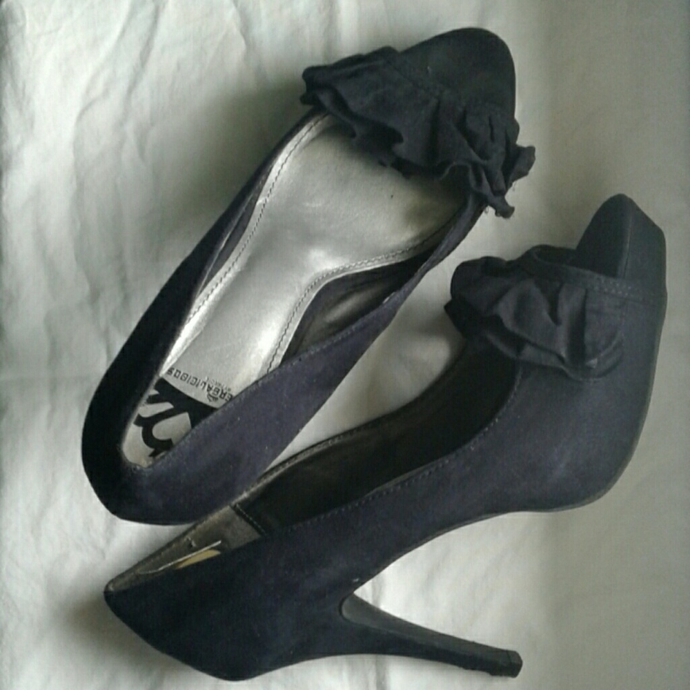 Black suede pumps